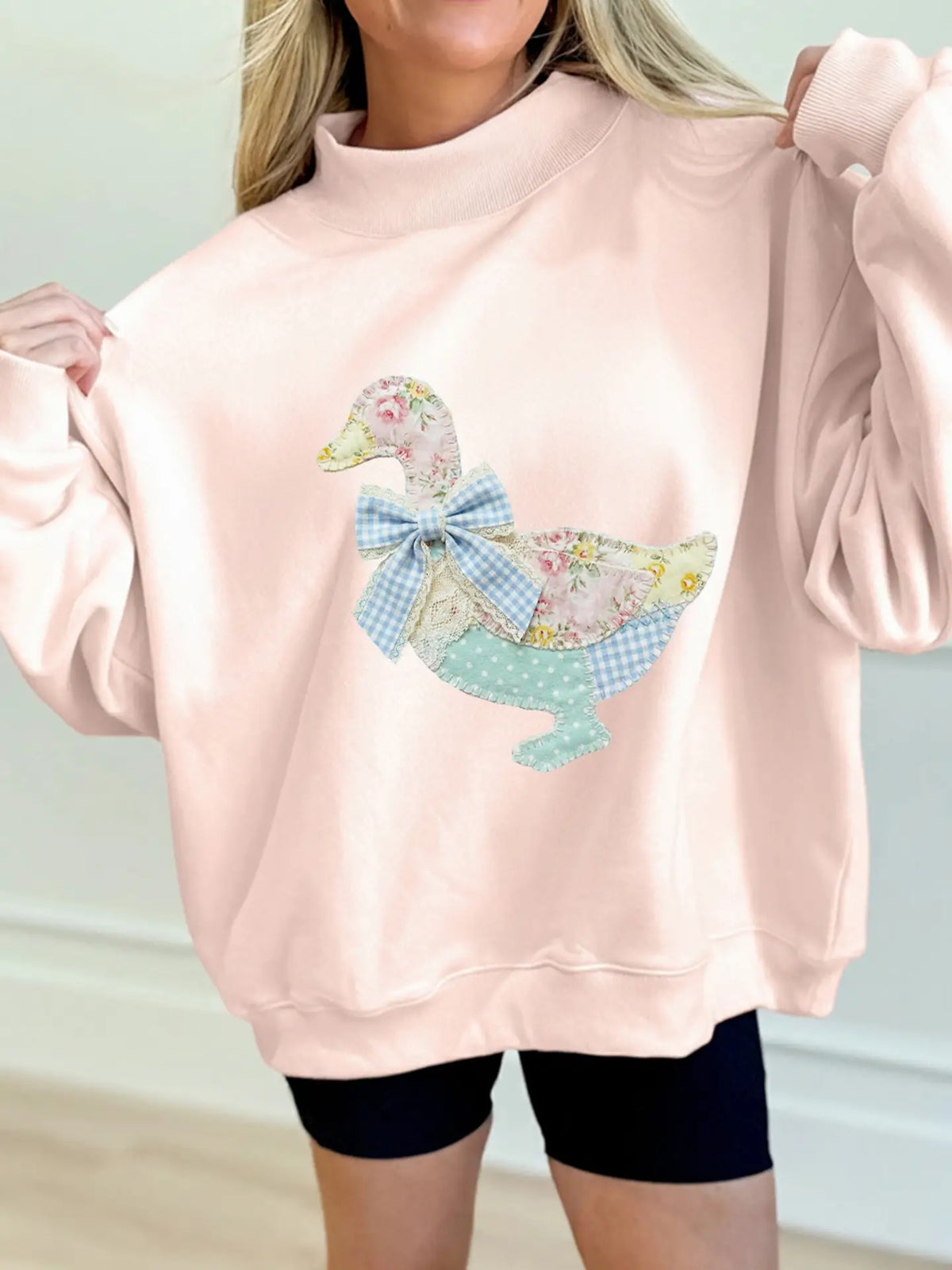 Whimsical "Faux Patchwork" Duck with Bow Sweatshirt