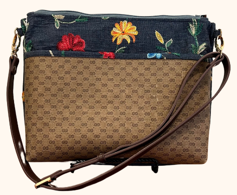 Redesigned - Crossbody Saddle Bag with exterior pocket made from Gucci coated canvas