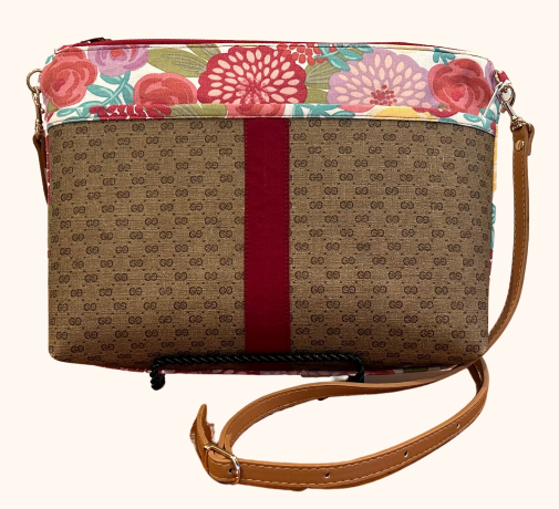 Redesigned - Crossbody Saddle Bag with exterior pocket made from Gucci coated canvas